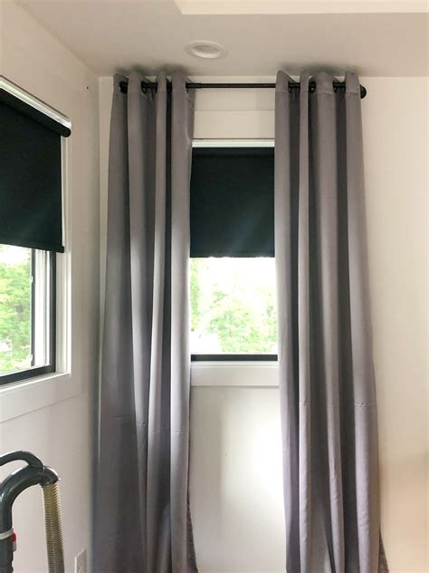 installing curtain rods above window